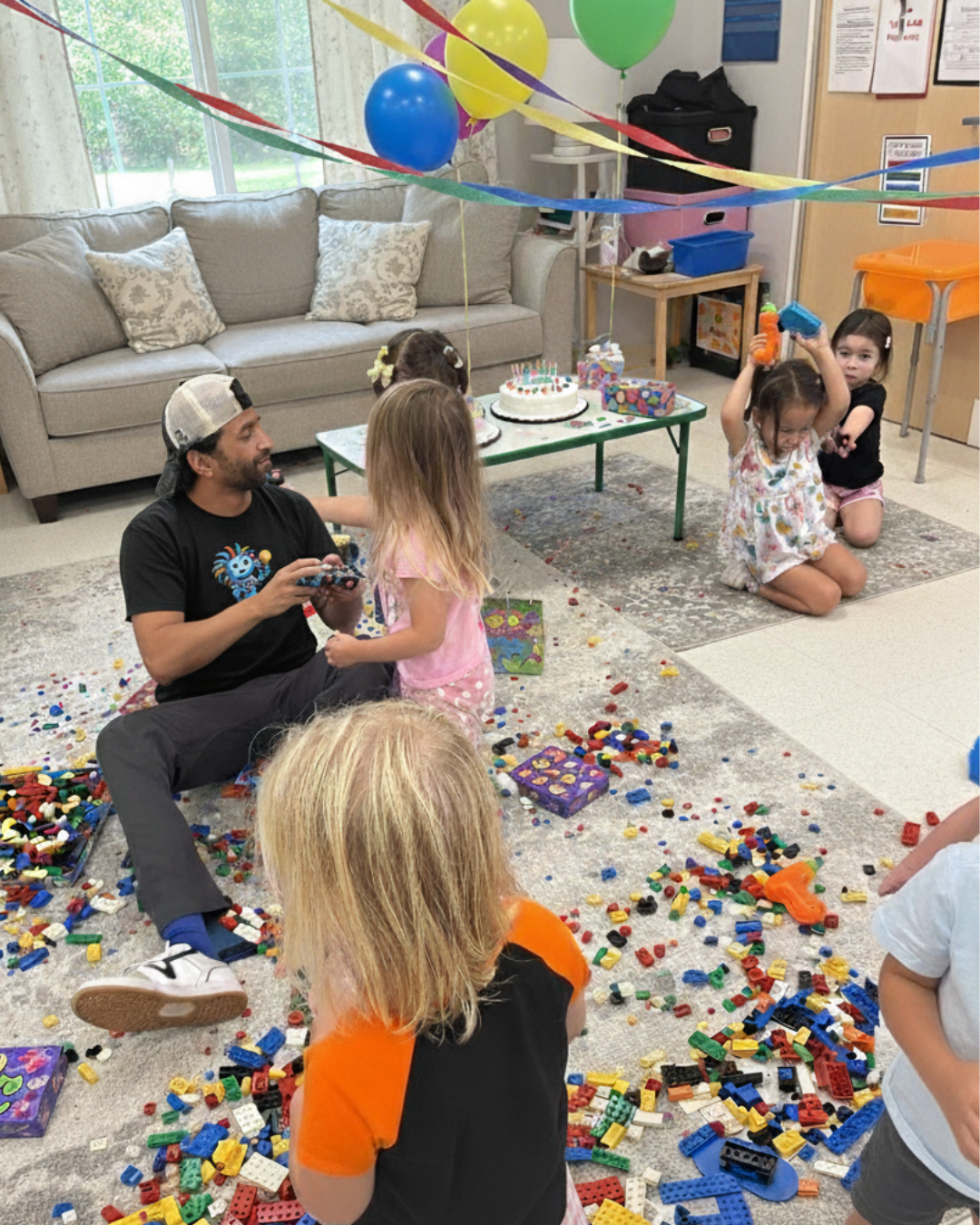 Children building creative projects at a STEM birthday party